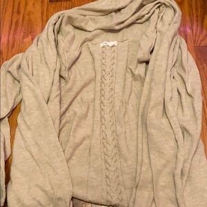 cream cardigan with adorable design in the back